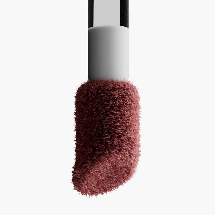 Close-up of a textured blush applicator